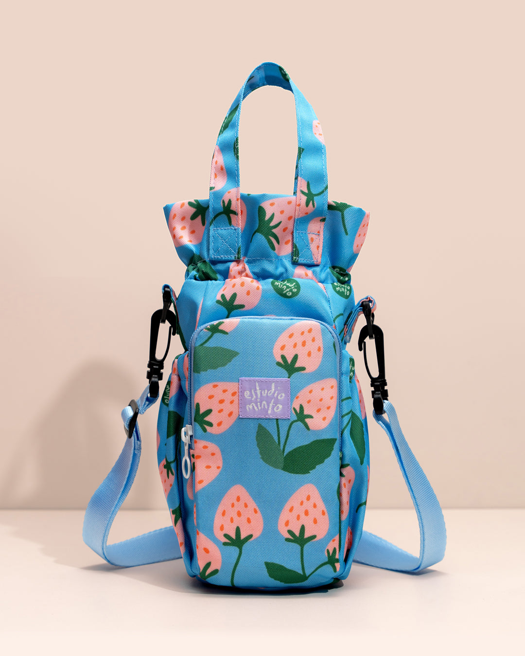 Bolso para Termo Fresa Fasci con compartimento para botella y espacio para objetos personales.