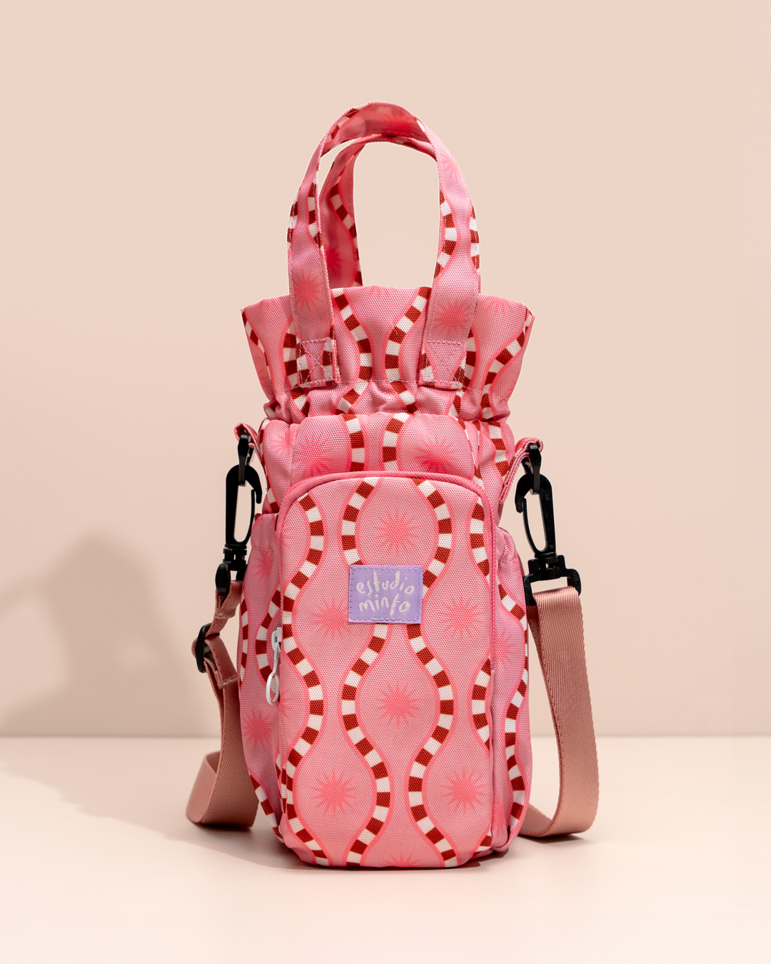 Bolso para Termo Sun Kiss Pink con compartimento para botella y espacio para objetos personales.
